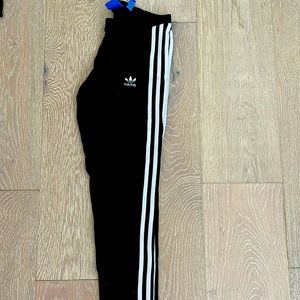 Womens leggings. White stripe on sides